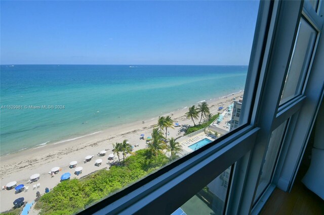 property view of water featuring a beach view