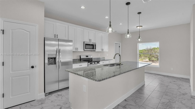 kitchen with white cabinetry, light tile patterned floors, appliances with stainless steel finishes, and sink