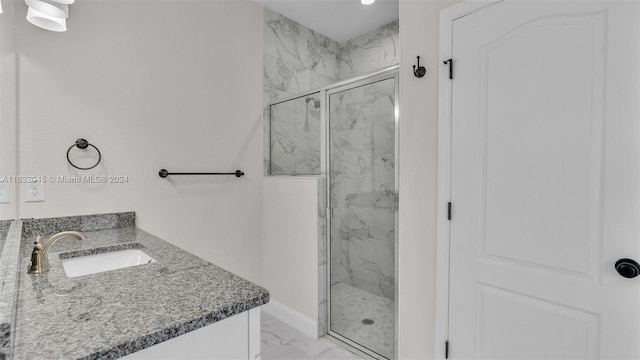 bathroom featuring walk in shower, tile patterned floors, and vanity