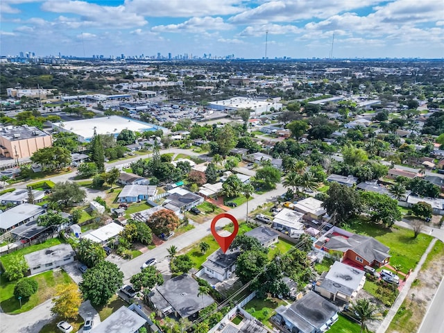 birds eye view of property with a city view