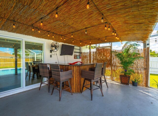 view of patio / terrace featuring a bar