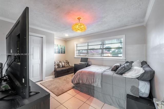 bedroom with a textured ceiling, crown molding, and light tile patterned flooring