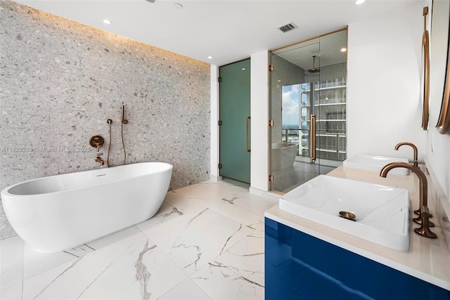 bathroom with plus walk in shower, vanity, and tile walls