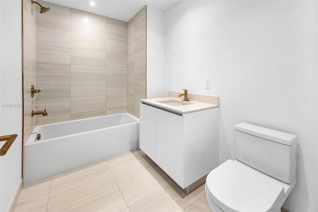 full bathroom featuring tile patterned flooring, vanity, toilet, and tiled shower / bath combo