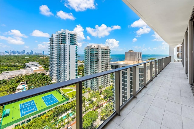 balcony featuring a water view