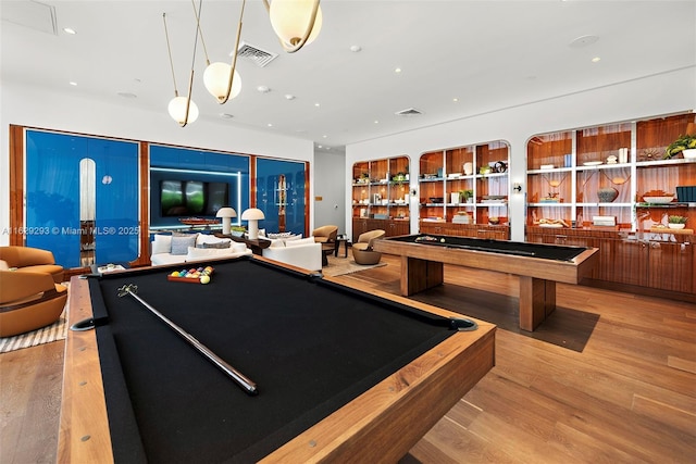 game room featuring light hardwood / wood-style flooring and billiards