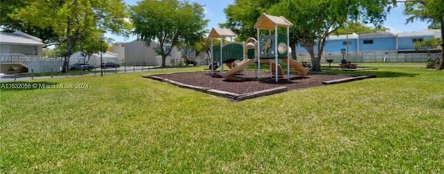 view of play area featuring a lawn