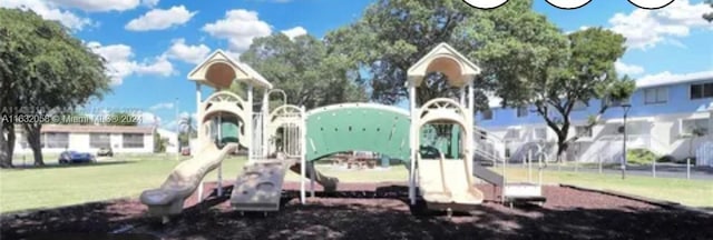 view of jungle gym with a yard