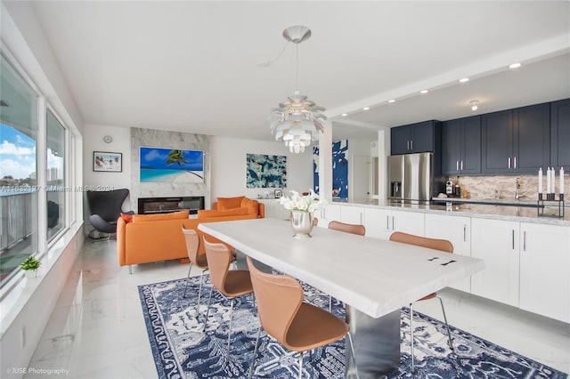 dining space with a fireplace