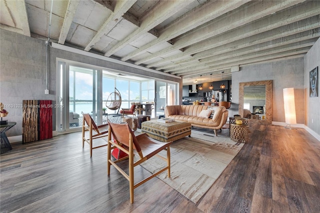 living room with wood-type flooring and a water view