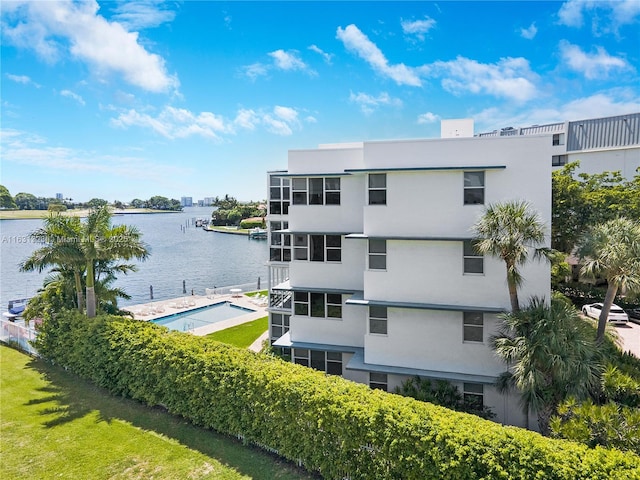 view of property with a water view