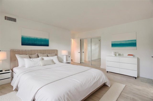 bedroom featuring light hardwood / wood-style flooring