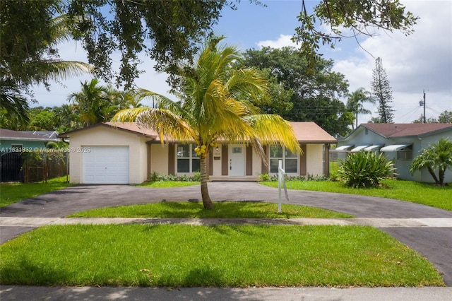 ranch-style home with a garage