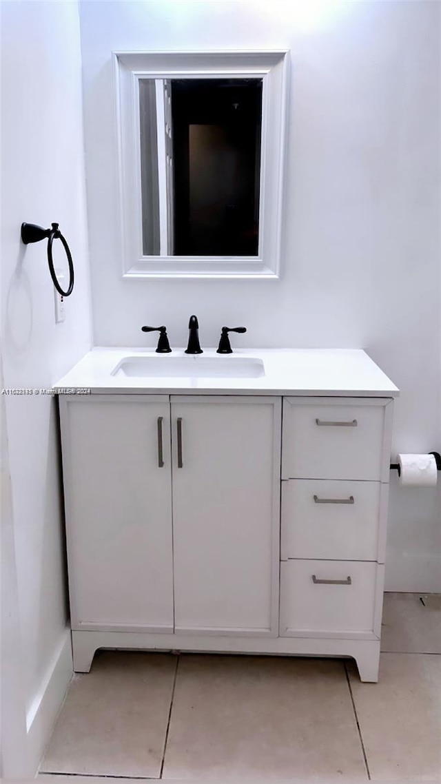 bathroom featuring vanity and tile patterned flooring