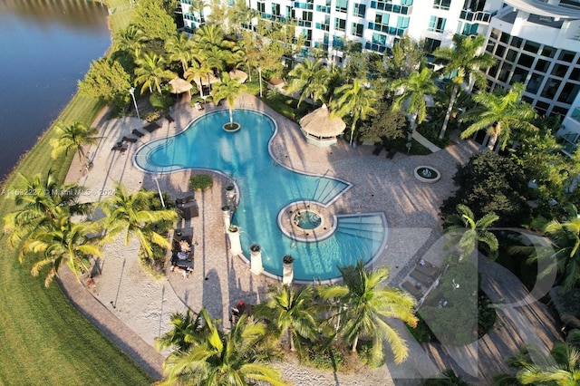 view of pool with a water view