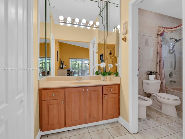 full bathroom featuring vanity, a bidet, toilet, and tile patterned floors