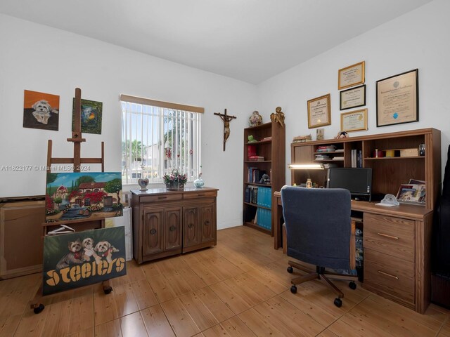 home office featuring light tile patterned floors