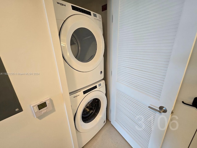 washroom with laundry area and stacked washer and dryer