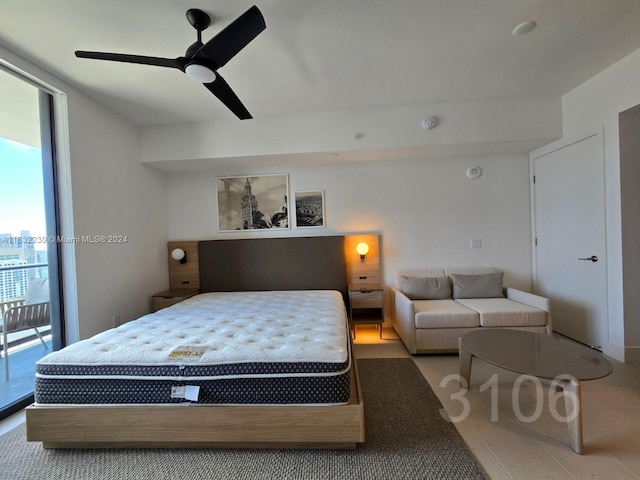 bedroom with access to exterior, floor to ceiling windows, and a ceiling fan