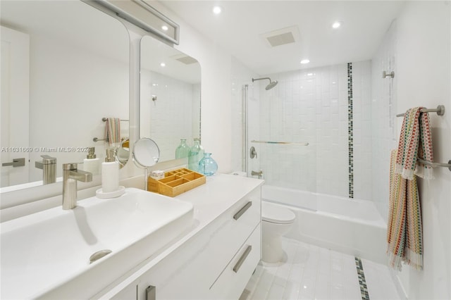 full bathroom featuring toilet, recessed lighting, visible vents, vanity, and tub / shower combination