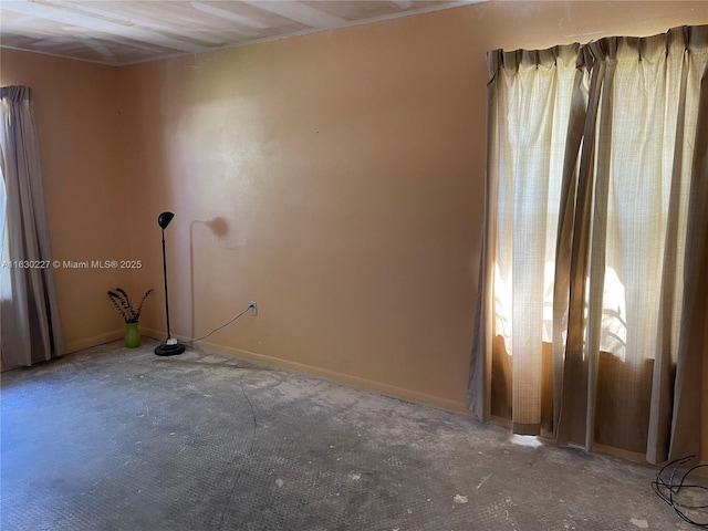 spare room featuring a wealth of natural light