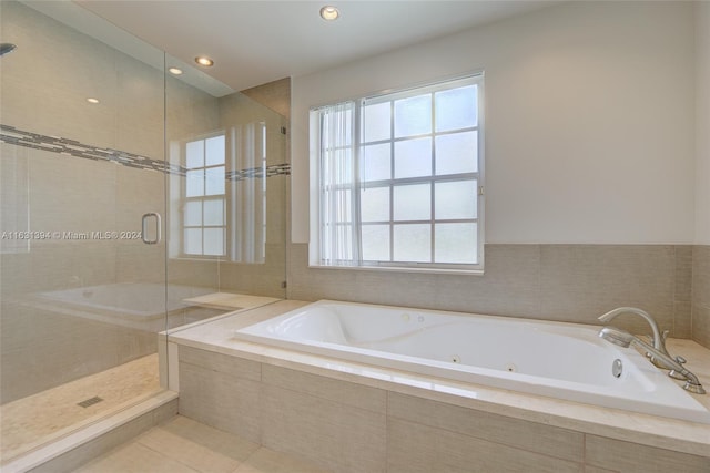 13377 NW 7th St, Plantation, FL 33325 - full bath featuring a jetted tub, tile patterned floors, a stall shower, and recessed lighting