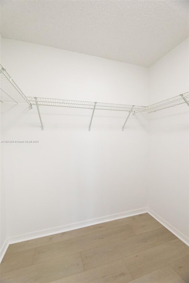 13377 NW 7th St, Plantation, FL 33325 - spacious closet featuring light wood-style floors