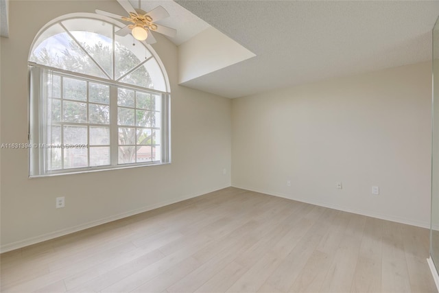 13377 NW 7th St, Plantation, FL 33325 - spare room featuring baseboards, a ceiling fan, and light wood-style flooring