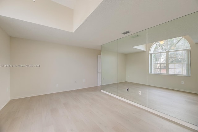 13377 NW 7th St, Plantation, FL 33325 - unfurnished room with light wood-style floors, baseboards, and visible vents