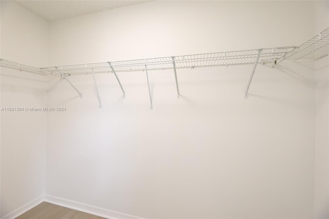 13377 NW 7th St, Plantation, FL 33325 - walk in closet featuring light wood finished floors