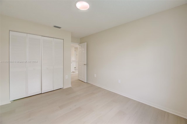 13377 NW 7th St, Plantation, FL 33325 - unfurnished bedroom with baseboards, a closet, light wood finished floors, and visible vents