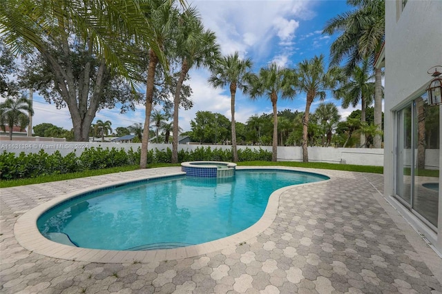 13377 NW 7th St, Plantation, FL 33325 - view of swimming pool with a fenced backyard, a patio area, and a pool with connected hot tub