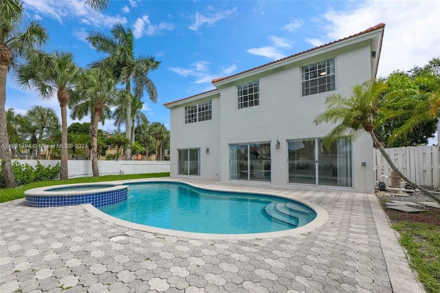 13377 NW 7th St, Plantation, FL 33325 - view of pool with a patio, a pool with connected hot tub, cooling unit, and a fenced backyard