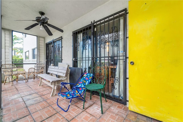 view of patio / terrace featuring ceiling fan and a porch