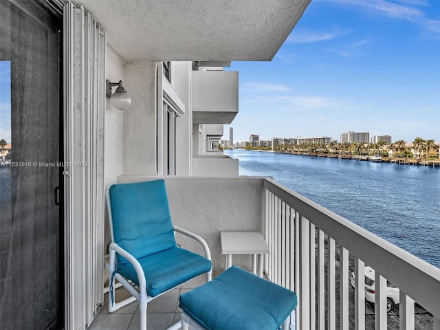 balcony featuring a water view