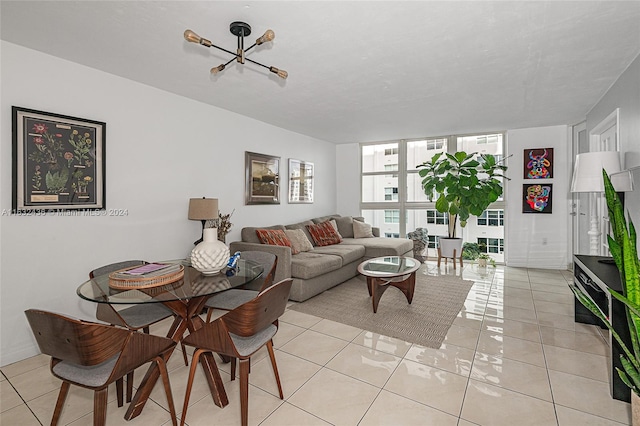 living room featuring light tile patterned flooring and floor to ceiling windows