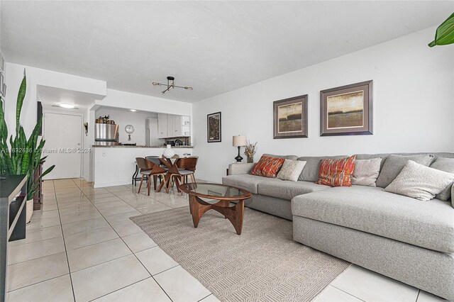 living room with light tile patterned flooring