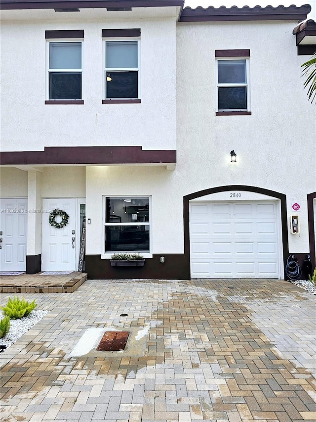 view of front of property featuring a garage