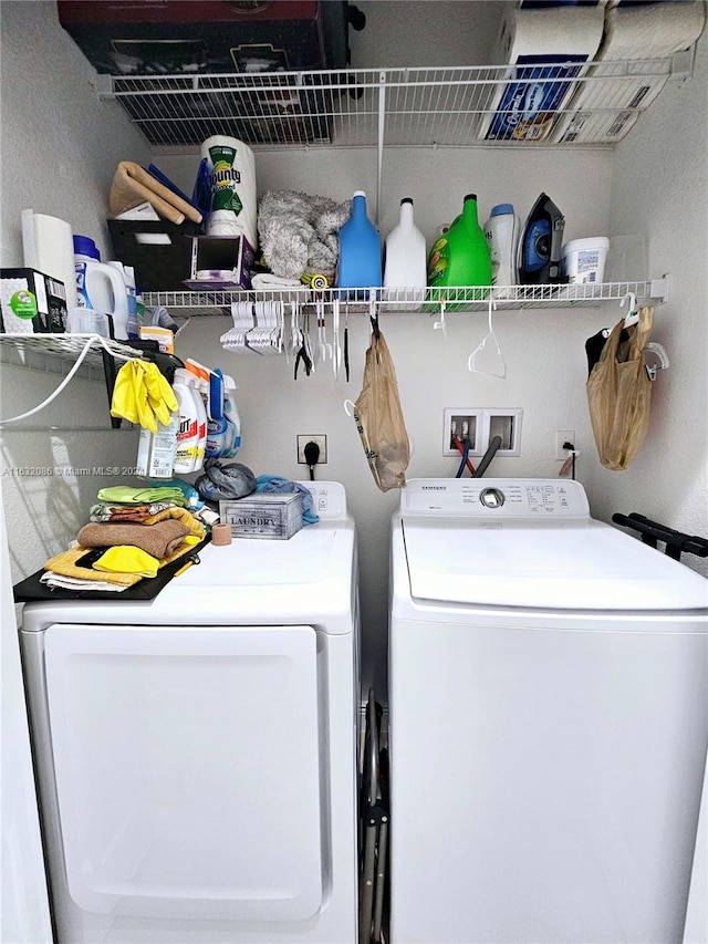 washroom with washer and clothes dryer