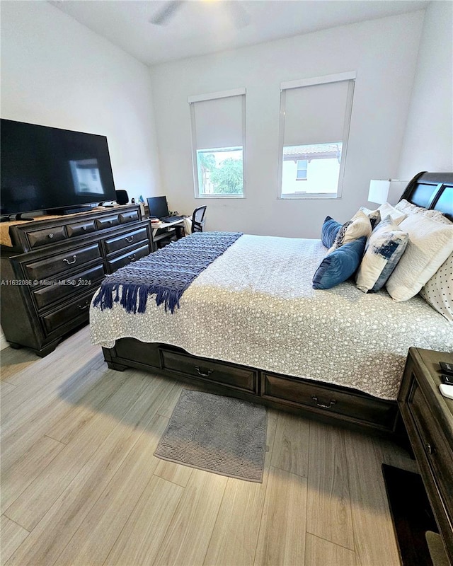 bedroom featuring ceiling fan and light wood-type flooring