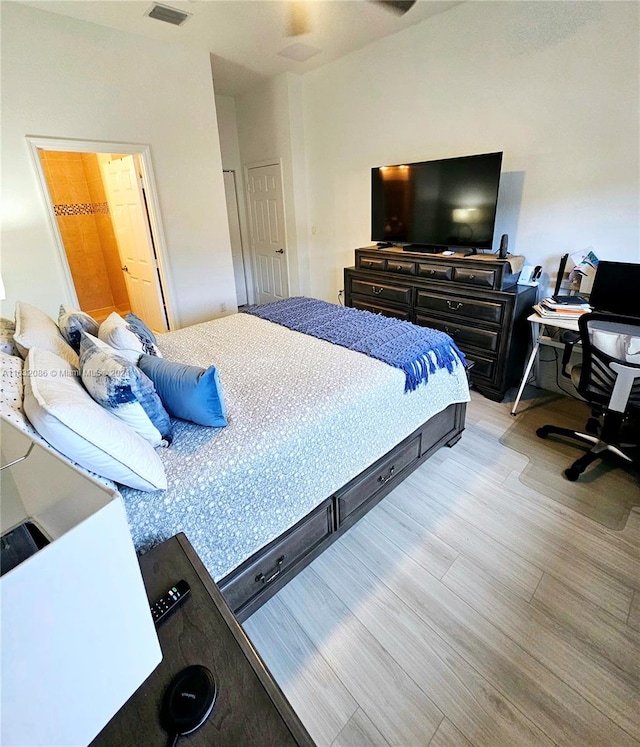 bedroom featuring light hardwood / wood-style floors