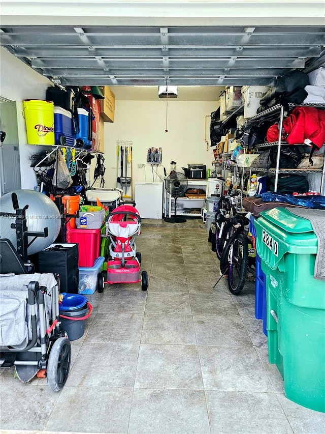 garage featuring a garage door opener