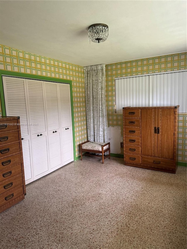 unfurnished bedroom with a closet