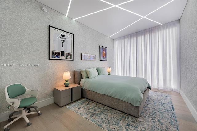 bedroom featuring light hardwood / wood-style floors