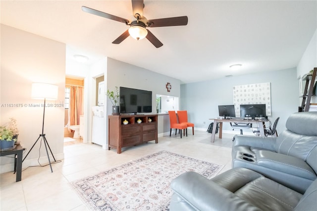 tiled living room featuring ceiling fan