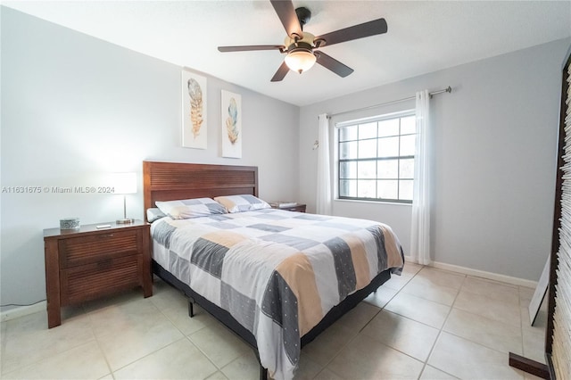 bedroom featuring ceiling fan and light tile patterned floors