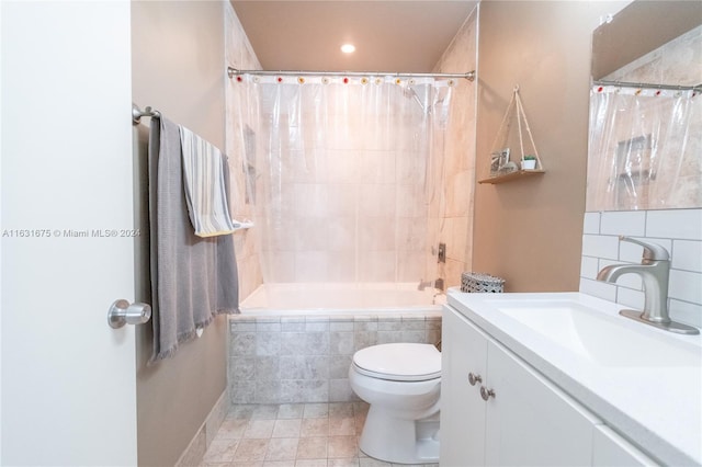 full bathroom with tile patterned floors, vanity, tile walls, toilet, and shower / bathtub combination with curtain