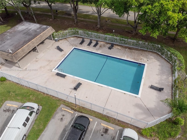 view of swimming pool with a patio area