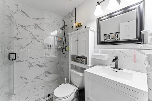 bathroom with a shower with shower door, vanity, decorative backsplash, and toilet