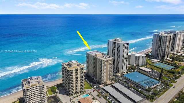 aerial view featuring a water view and a view of the beach